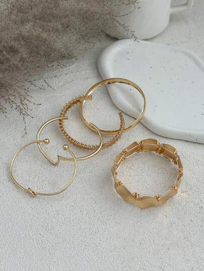 Minimal gold jewelry and everyday accessories